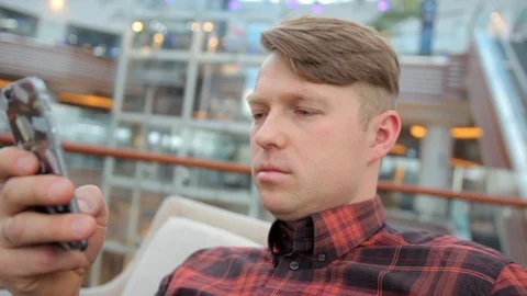 Man uses smartphone. Stock Footage 105978053