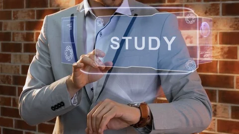 Man uses smartwatch hologram Study Stock Footage 127135213