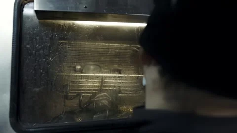 Man uses specialized high pressure washer stand for the metal rusty oily car Stock Footage 285643653