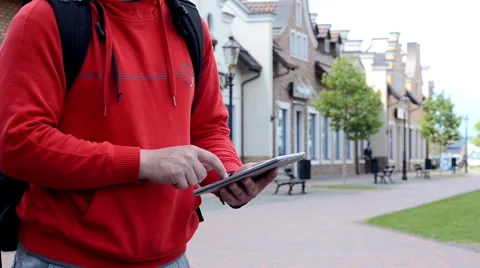 A man uses a tablet. Stock Footage 64734316