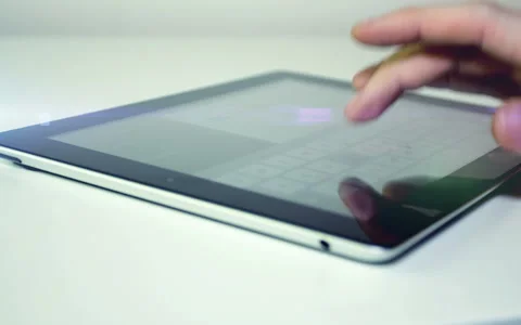 Man uses tablet pc Stock Footage 49318923