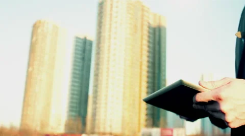 Man uses tablet pc Video stock 49356716