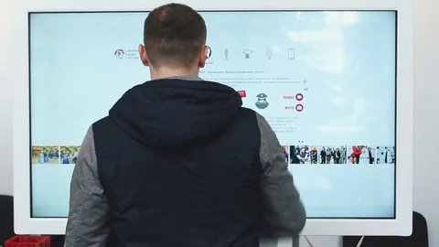 The Man Uses a Touch Screen Smart Tv Stock Footage 82021806