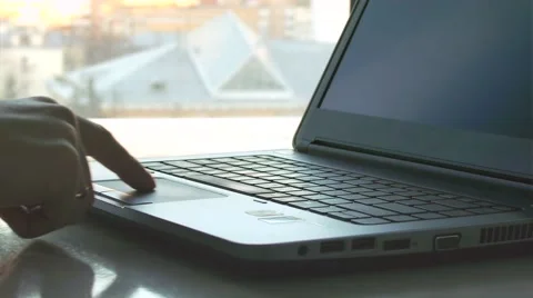 Man uses a touchpad Stock Footage 61356417
