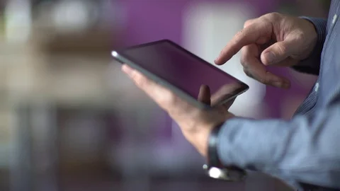 A man uses a touchscreen smartphone. Stock Footage 70381183