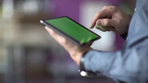 A man uses a touchscreen smartphone. Video stock 70381294