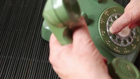 Man uses vintage green phone Stock Footage