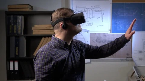 Man uses a virtual reality glasses in the office. Stock Footage 69879824