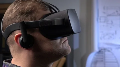 Man uses a virtual reality glasses in the office. Stock Footage 69879897