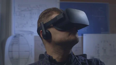 Man uses a virtual reality glasses in the office. Stock Footage 69880400