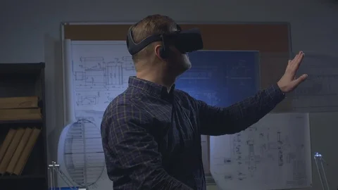 Man uses a virtual reality glasses in the office. Stock Footage 69880695