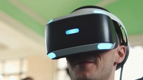 Man Uses Virtual Reality Glasses Stock Footage 82021656