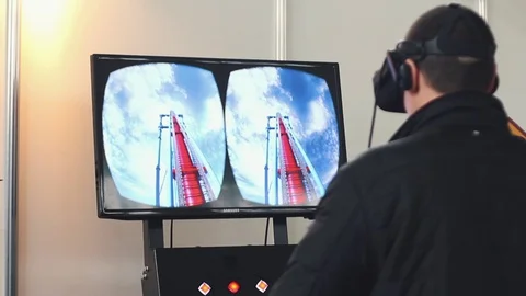 Man uses virtual reality glasses, the image on the monitor Stock Footage 82021921