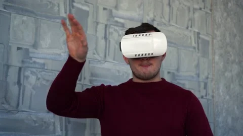 Man uses vr glasses while at home. Stock Footage 149100874