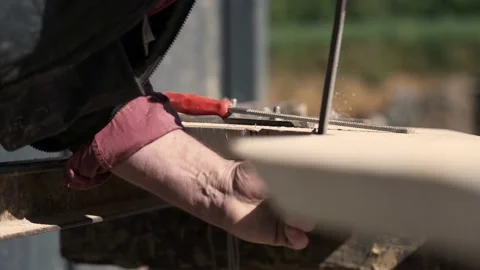 Man Uses Wood File to Shape Bell Casting Template Close Up Hands SLOMO Stock Footage 220942157