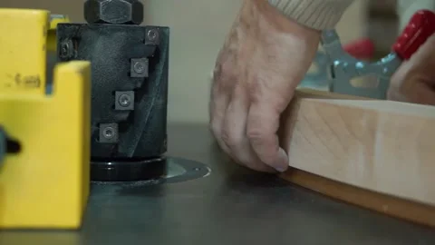 Man uses wood grinding machine Vidéo 163423399