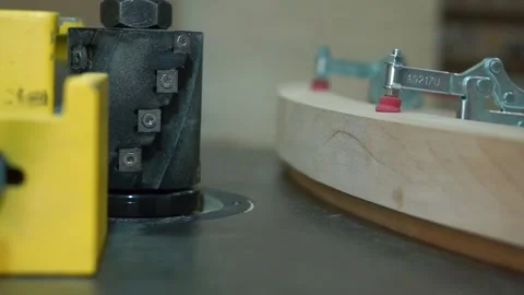 Man uses wood grinding machine Stock Footage 163423401