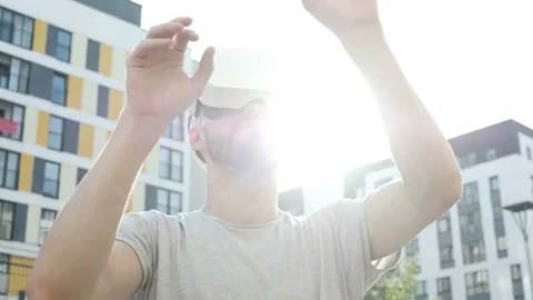 Man using 3D virtual reality headset. Virtual reality game. Stock Footage 94058220
