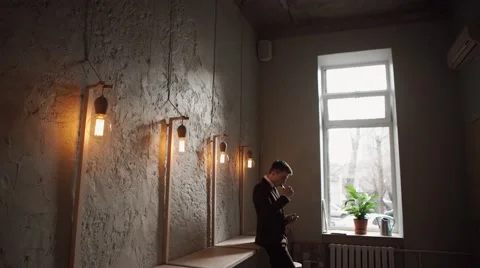 Man using an advanced personal vaporizer or e-cigarette Stock Footage 57112768