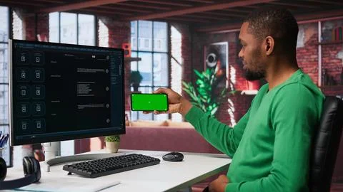 Man using AI chatbot to generate real time responses next to mockup display Foto stock