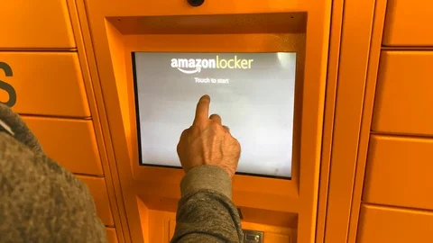 Man using Amazon Locker in shopping mall Stock Footage 125533252