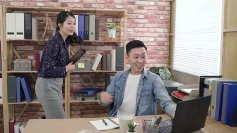 Man using and pointing at computer screen Stock Footage 154028896