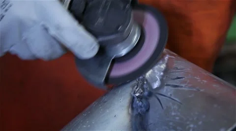 Man using angle grinder on steel Stock Footage 57297312