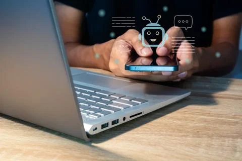 A man using Artificial Intelligence chatbot in a smart phone. Text to image.. 스톡 사진