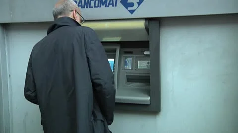 Man using ATM, Catania, Sicily, Italy Stock Footage 8846361