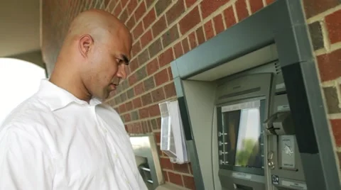 Man Using ATM Stock Footage 22772354
