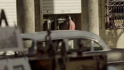 MAN USING ATM MACHINE IN OLD HAVANA, CUBA Stock Footage 72466349