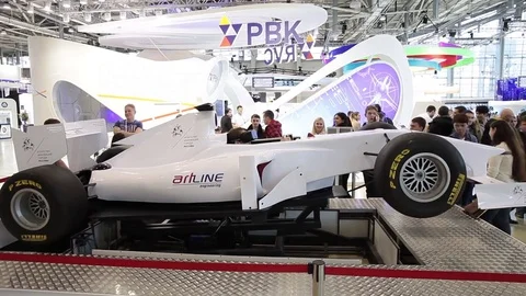 Man using auto simulator with virtual glasses in game center Stock Footage 80897911