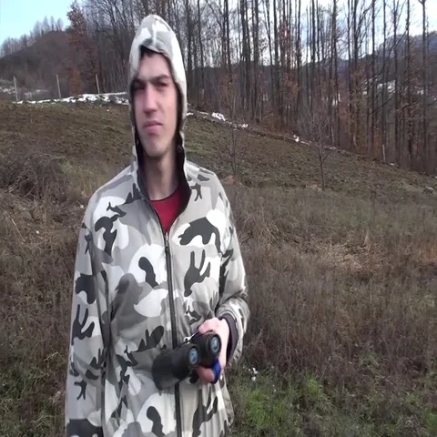 Man using binoculars looking landscape area Stock Footage 69511281