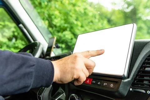 Man using blank touch screen on car console 스톡 사진