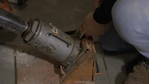 Man Using Bottle Jack Video stock 100828227