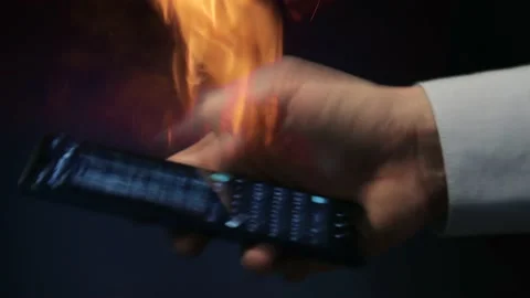A man using a burning smartphone Video stock 175719938