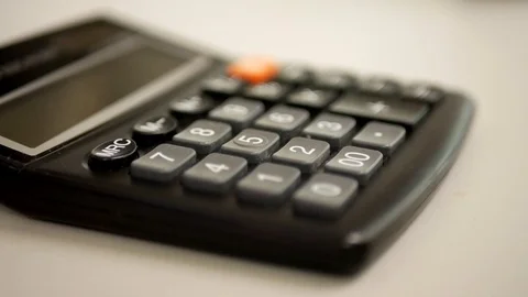 A man using a calculator close up Stock-Footage 94158996