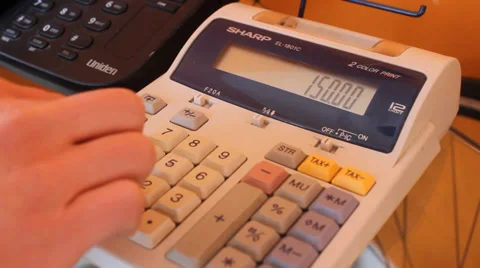 Man Using a Calculator Stock Footage 35226415