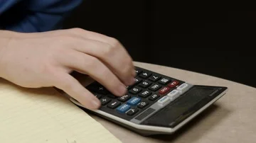 Man Using Calculator Stock Footage 85637702