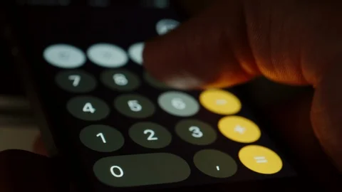 Man Using Calculator Software On His Smartphone Stock Footage 114210938