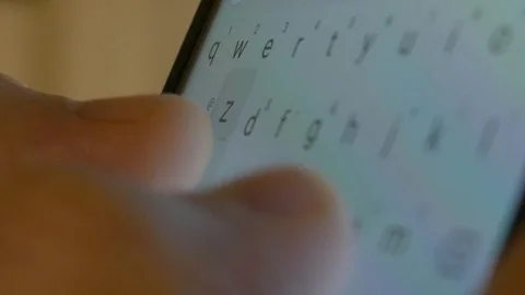 Man using calendar app on the mobile device. Male hands scrolling on smartphone. 库存影片 126774174