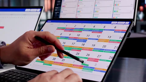 Man Using Calendar Software Stock Footage 328395112