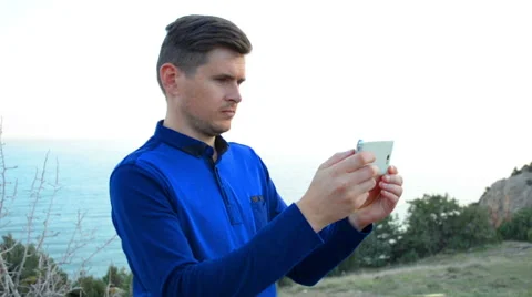 Man using  camera app on smartphone Stock-Footage 44499378