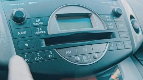 Man using car audio stereo system Stock Footage 88391569