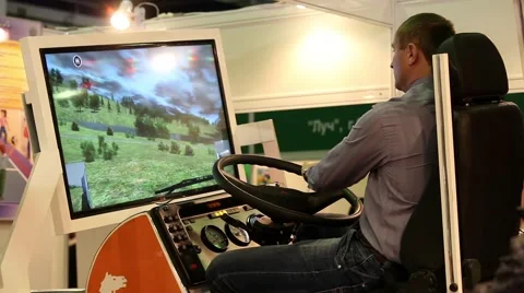 Man using car simulator Stock Footage 49280707