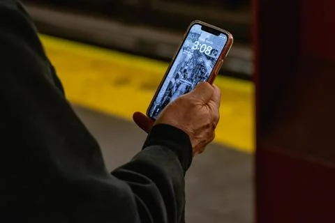 Man using Cell Phone in Subway in NYC Stock Photos