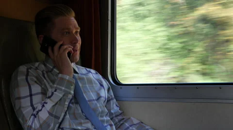 Man using cellphone on train Video stock 67353682