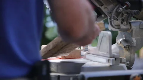 Man using Chop Saw outside on a construction site Stock Footage 65092919
