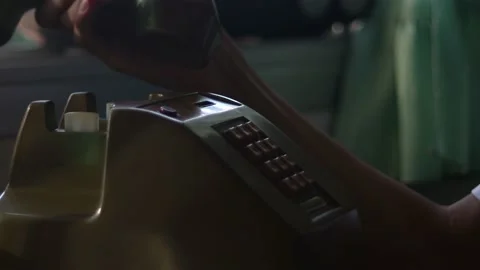 Man using an classic telephone and listening to the radio by the window. Stock Footage 170531715
