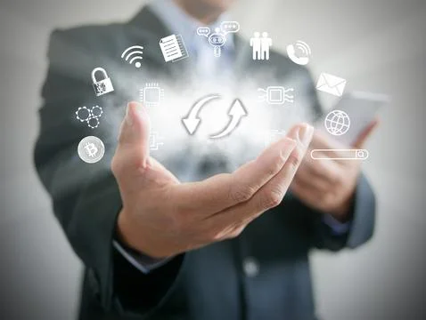 A man using cloud storage or technology with up and down arrows for uploadi.. Stock Photos